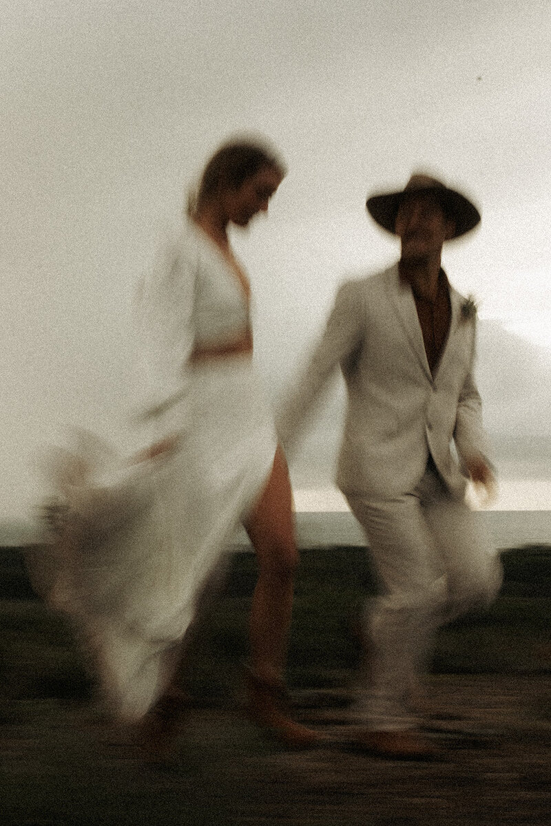Brisbane photographer documenting an intimate elopement with moody, romantic motion.