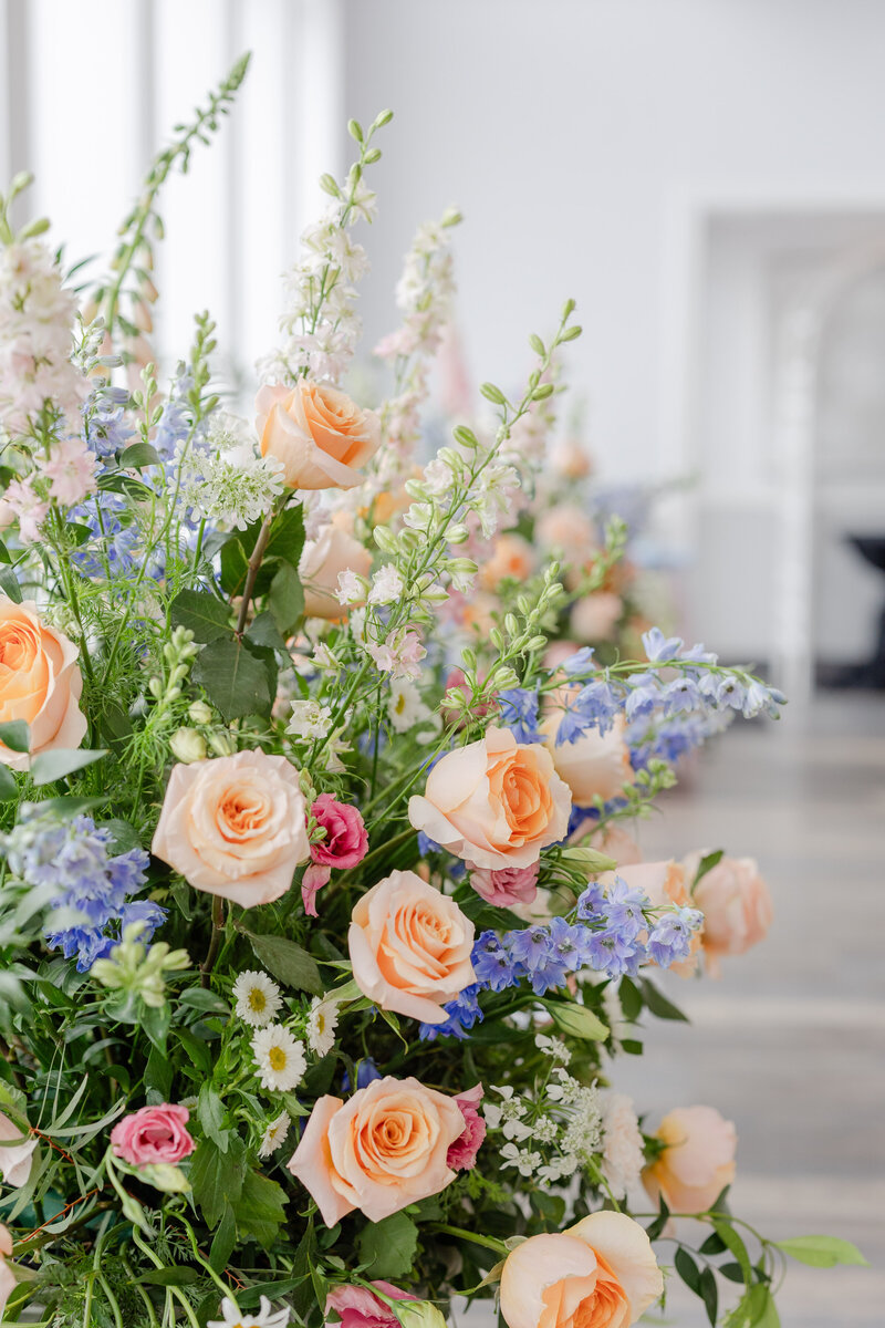 Floral arrangements featuring
garden roses and delphinium.
Wedding florist for Celebrations at
the Bay in Maryland.