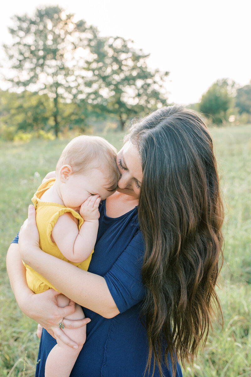 woman holding baby