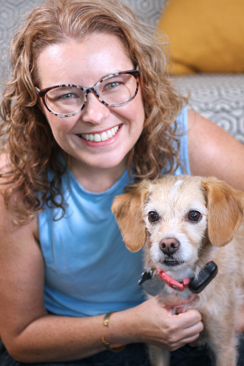 Mary Beth Lynn, Travel Advisor Coach, with her dog Sadie