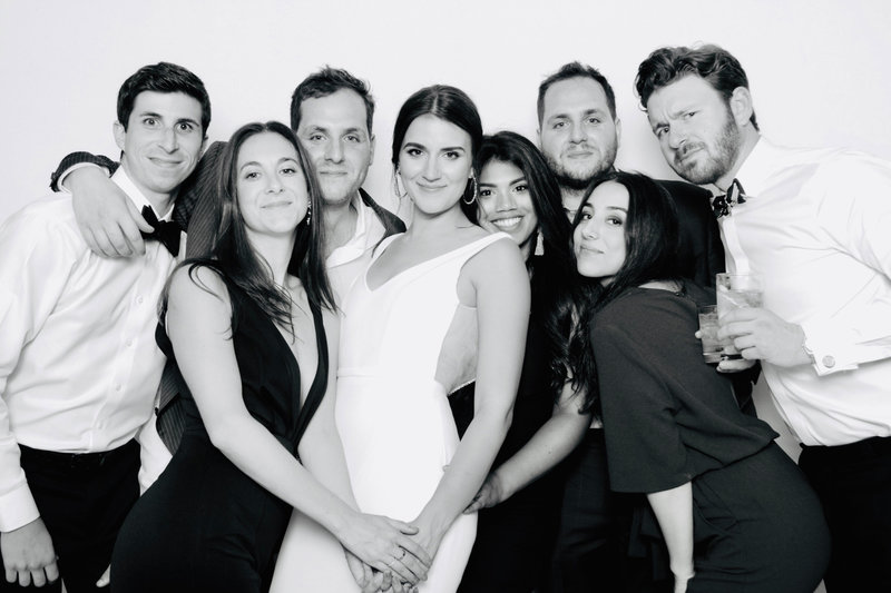 group of people posing in a wedding with the kardashian filter
