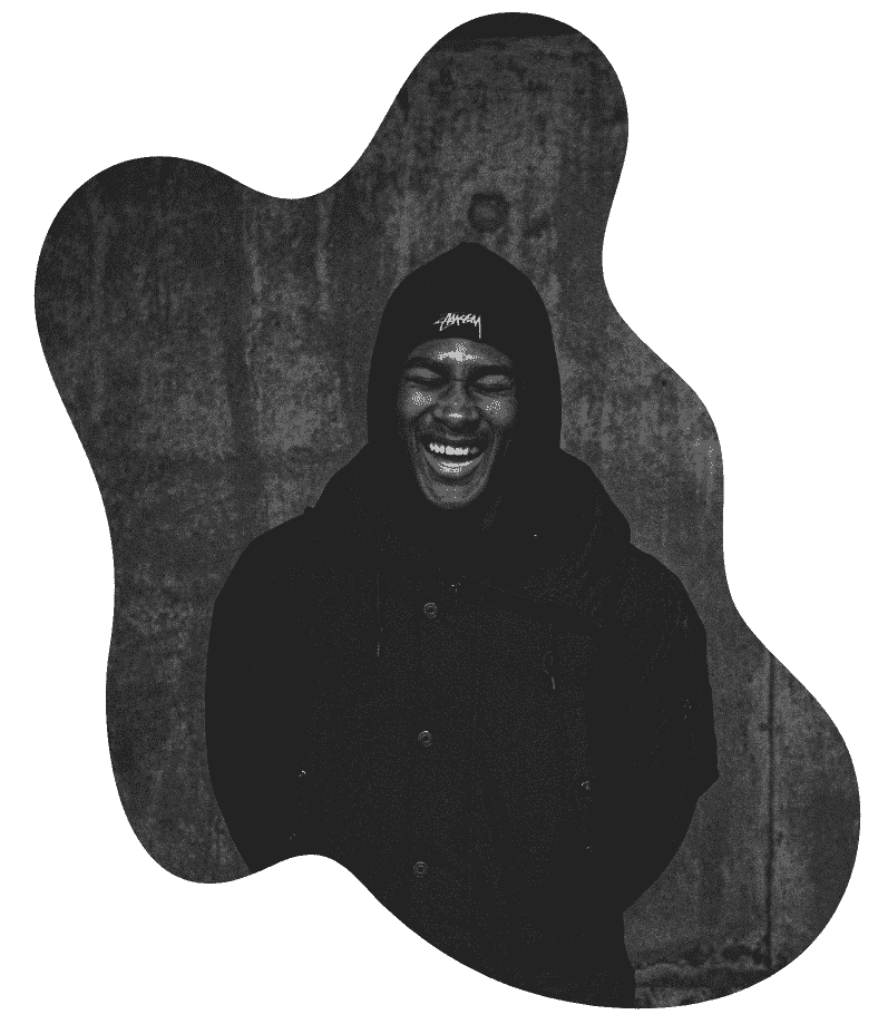 a young black male smiling after therapy in Massachusetts