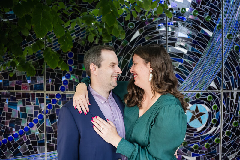 engaged couple posing in baltimore