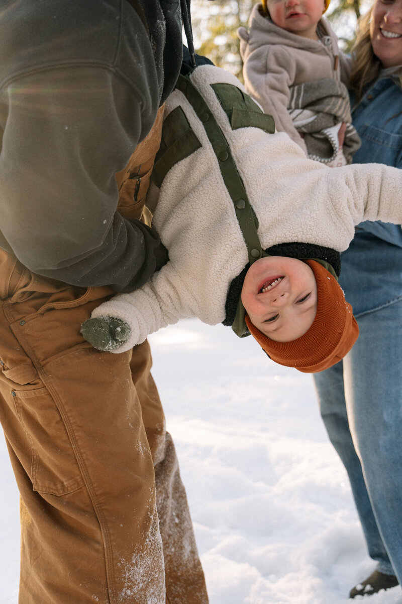 Despite the chill, this shoot was all about the simple joy of being together, making winter memories with their kids!