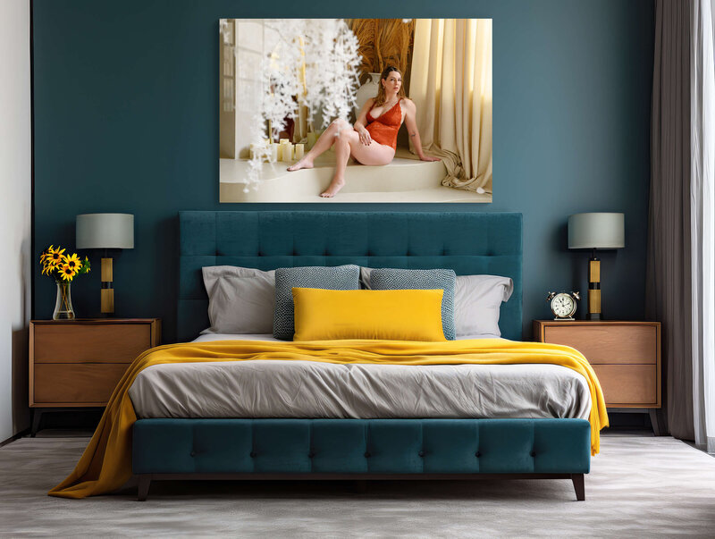 Blue and Yellow room with a bed and a photo of a Toronto boudoir photography session