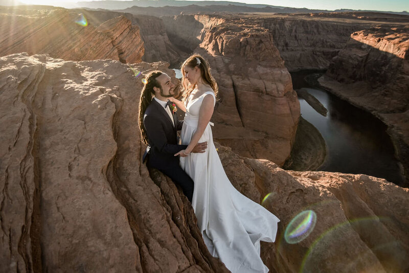 Bride and groom at Horseshoe Bend in Page Arizona