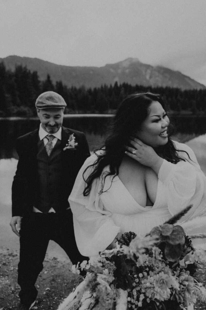 Black and white portrait of couple  on their elopement day at Gold Creek Pond Loop.