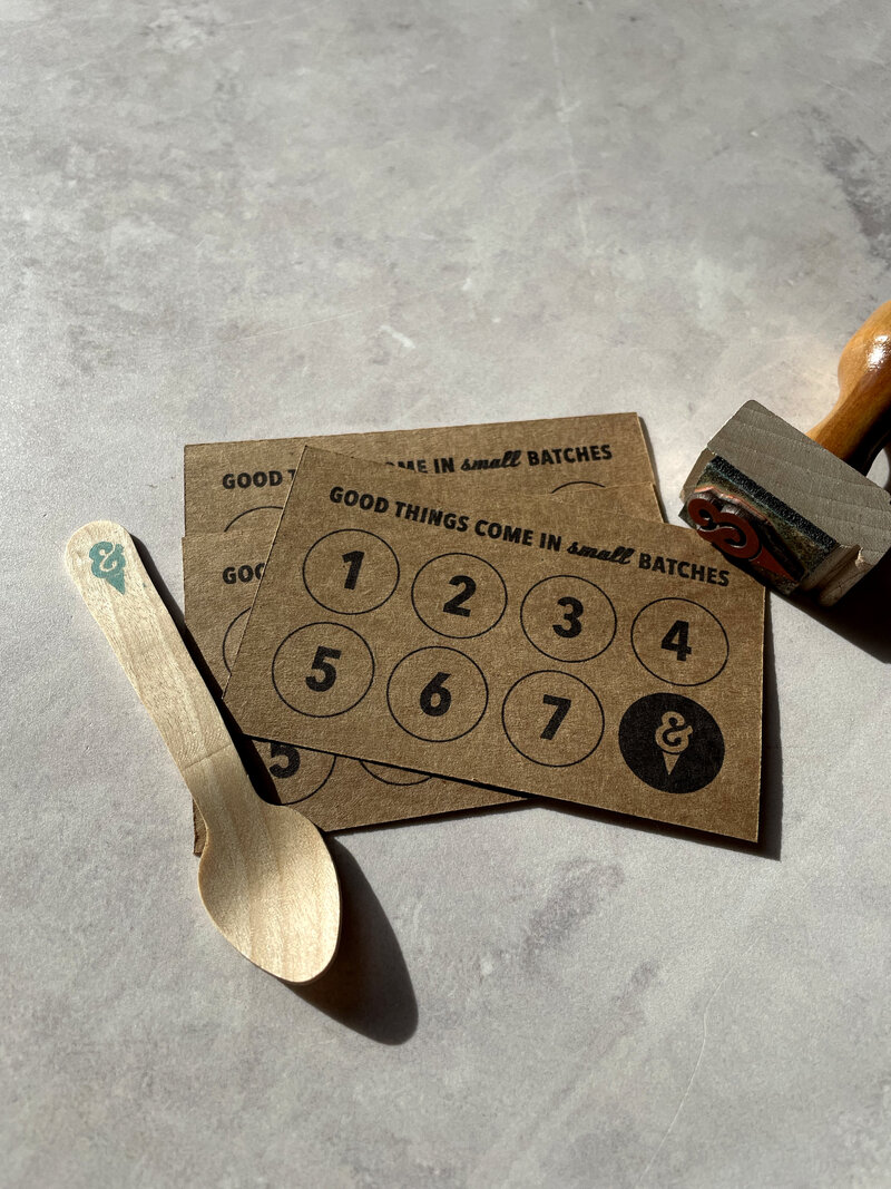 ice cream shop loyalty card design and wooden spoon
