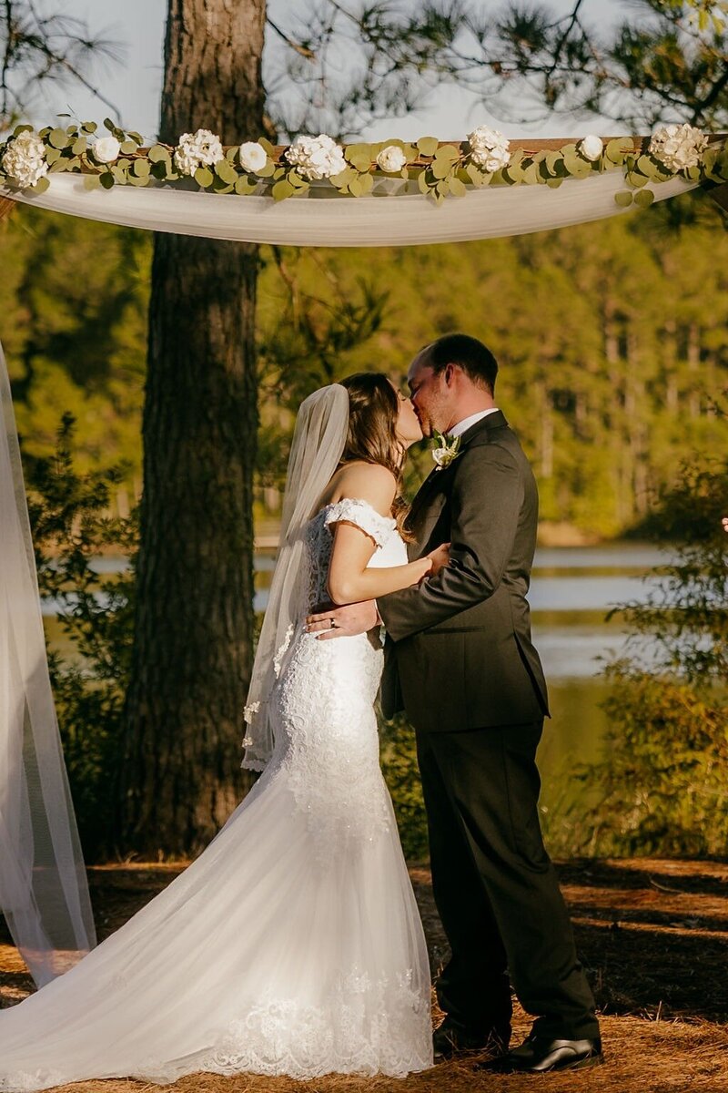 First kiss at Lake House at Bulow in Charleston SC 