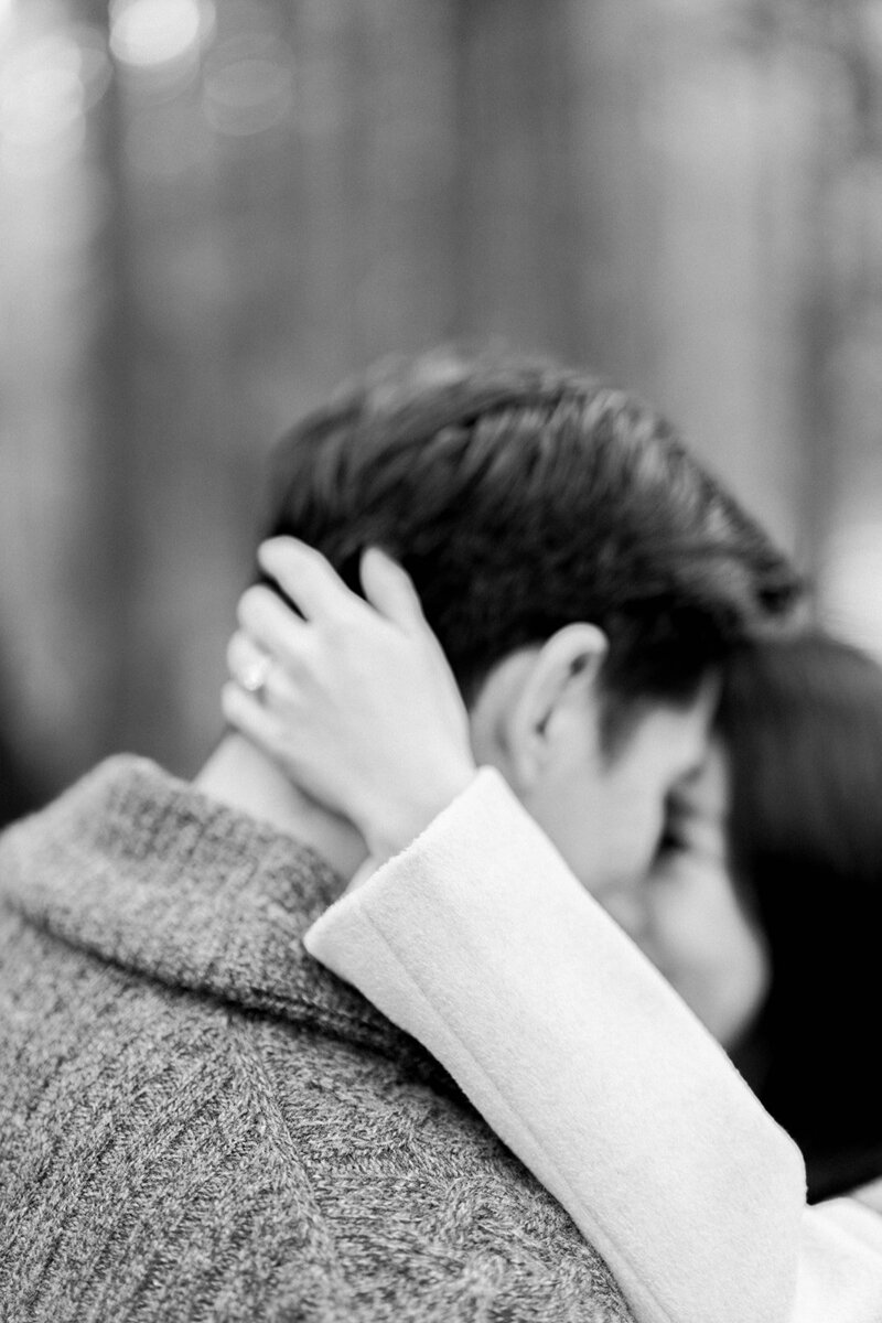 A close-up of a romantic moment between a couple during their engagement session in Napa Valley, California, captured by Tiffany Longeway Photography.