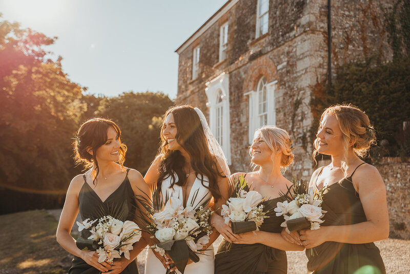 Bride and Bridesmaids in sunshine