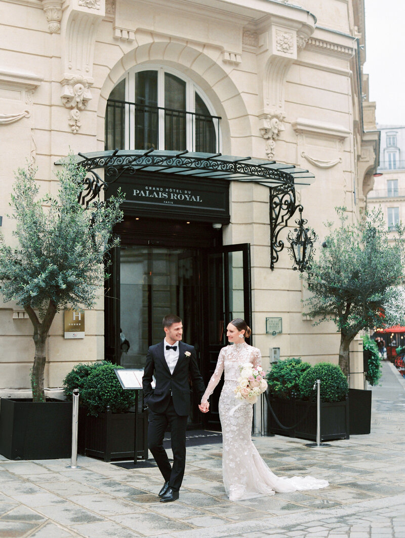 The Bride and Groom in front of the Grand Hôtel du Palais Royal