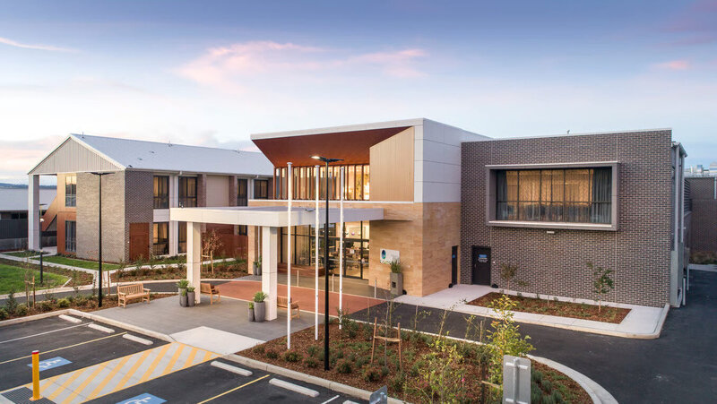 Community or religious building entrance with pathway and accessible ramp