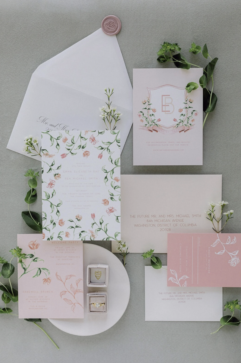 Sage suede styling mat with botanical details and vow books