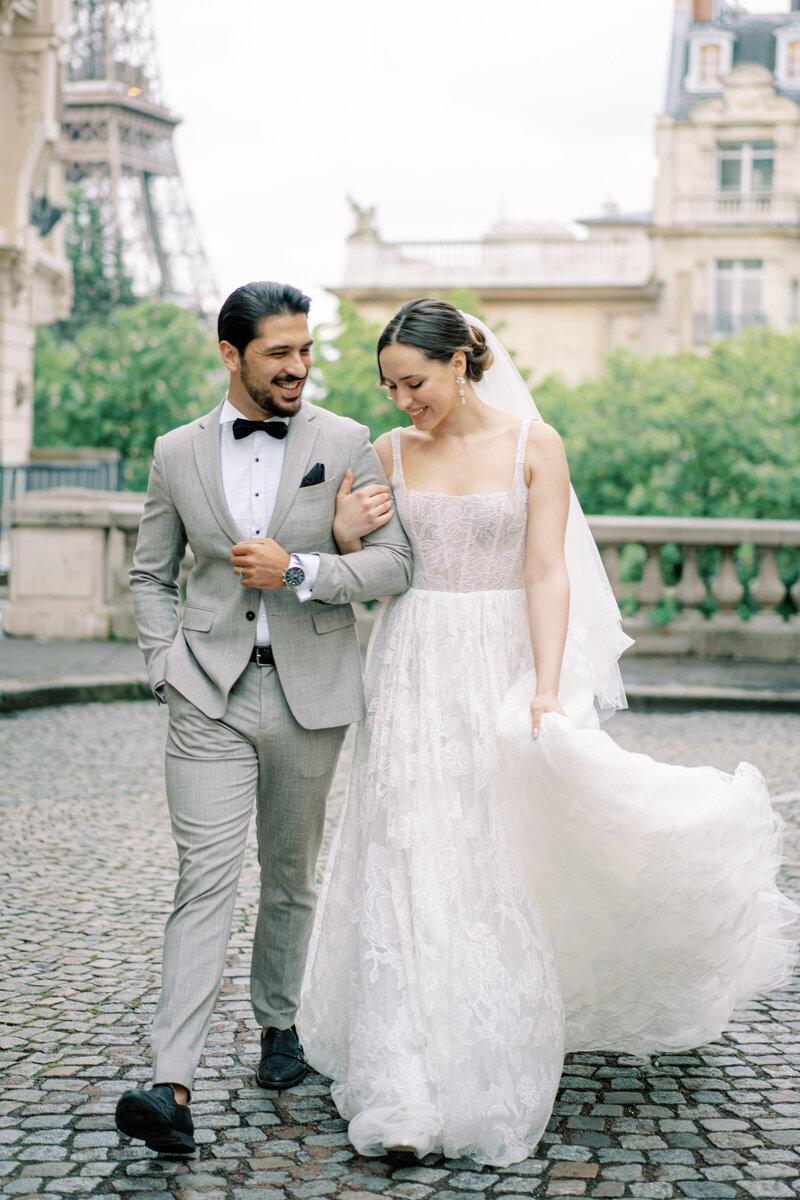 Bride and groom walk up memorial steps at their DC wedding