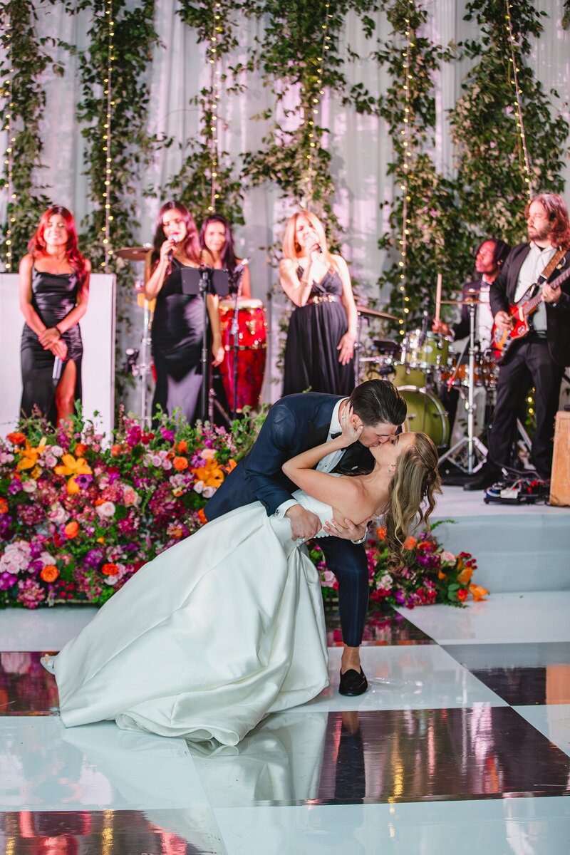 bride-groom-dipping-south-florida-reception