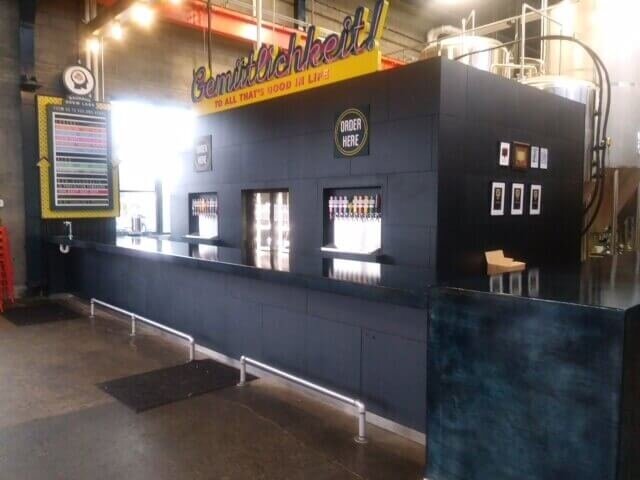Nave blue concrete countertop on bar and POS at a brewery