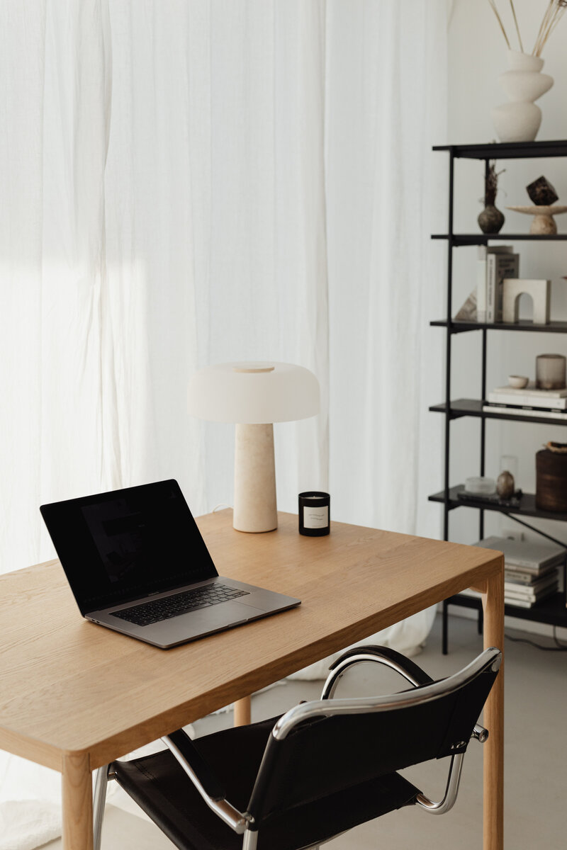 laptop open on home office desk