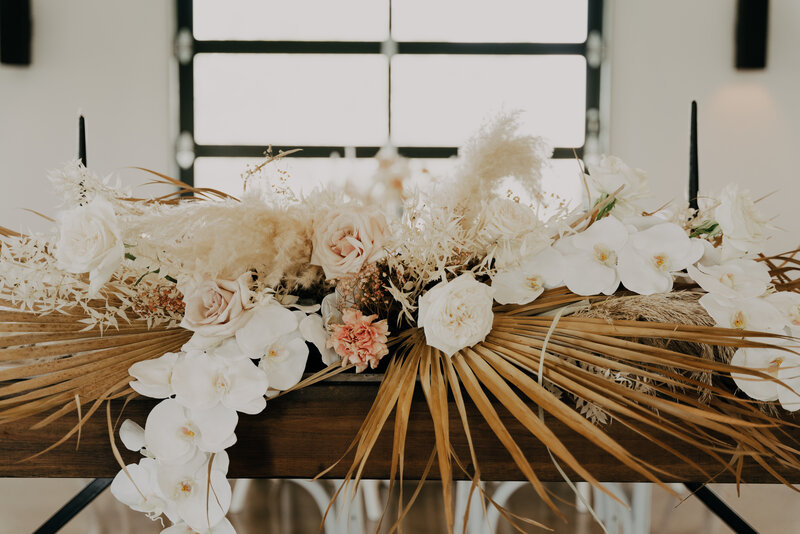 dallas wedding photographers boho floral arrangement on table