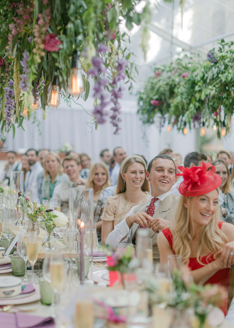 chloe-winstanley-weddings-guests-speeches-hanging-florals