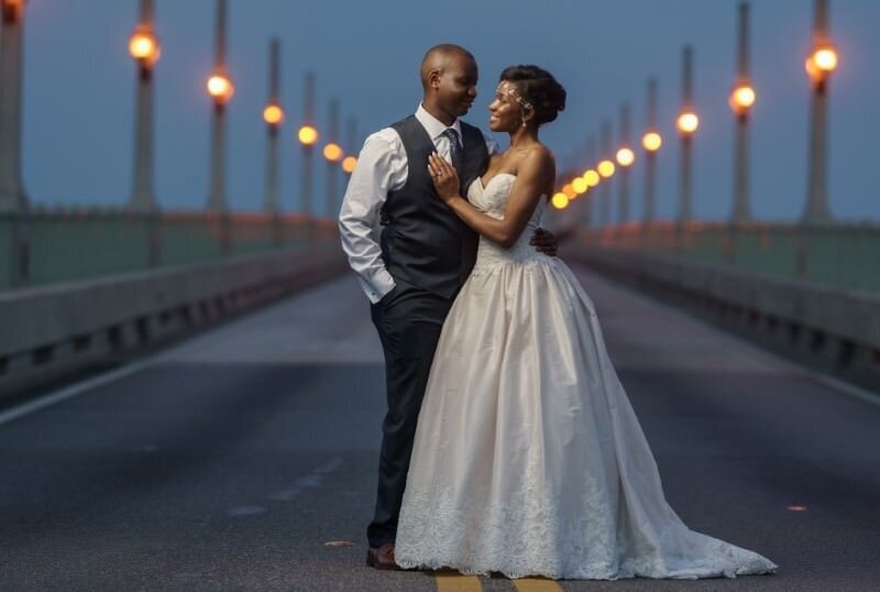 African American Couple pose on the Bridge of Lions in St Augustine Florida