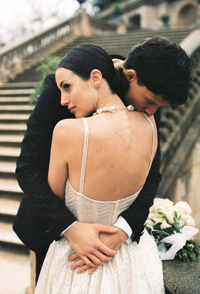 Bride and groom walking on the streets of Boston
