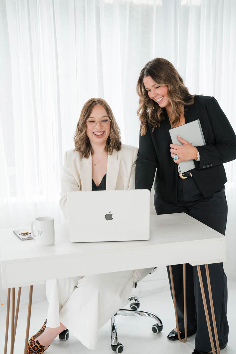 ashe and sarah using computer