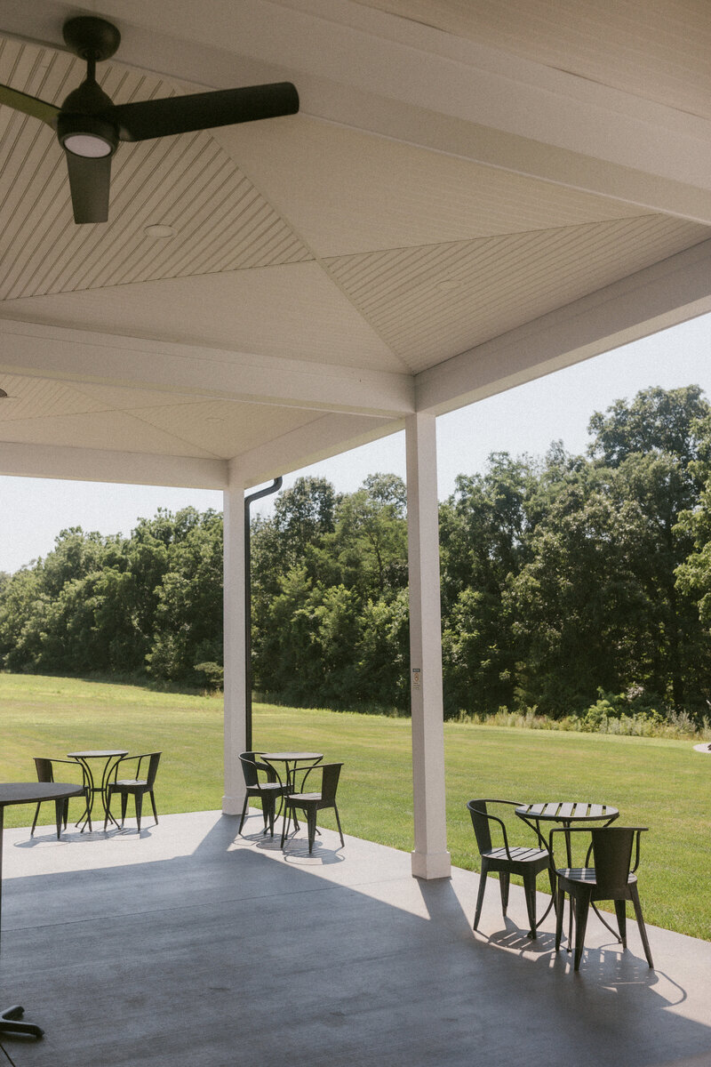 Outdoor covered veranda venue with forest views