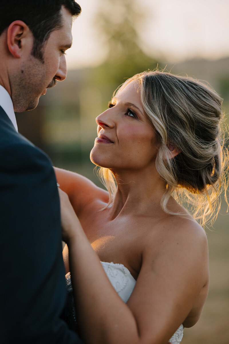 Bride and groom posing for wedding photos