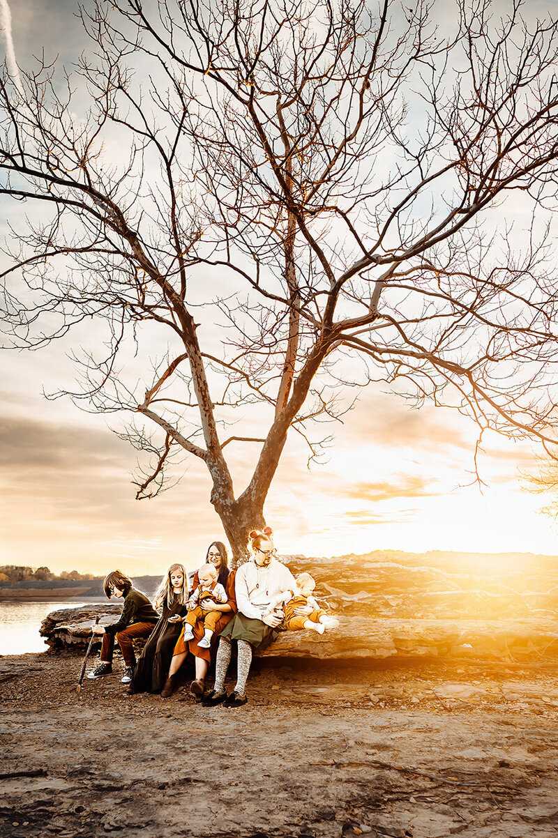 Bowling Green, Kentucky Family photographer.  Family at the lake watching the sunset.