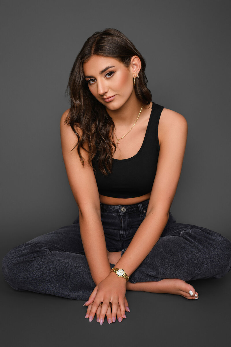 Capture your teen's personality with magazine-quality studio portraits by Leslie Q Photography. Our professional sessions deliver high-end, confidence-boosting images. Conveniently located in New Carlisle, serving South Bend, Michigan City, and surrounding areas.