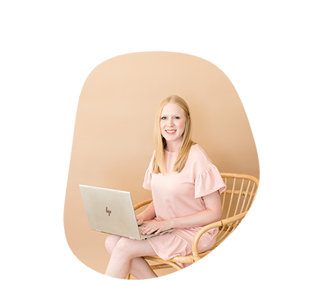 Virtual assistant sitting with a laptop