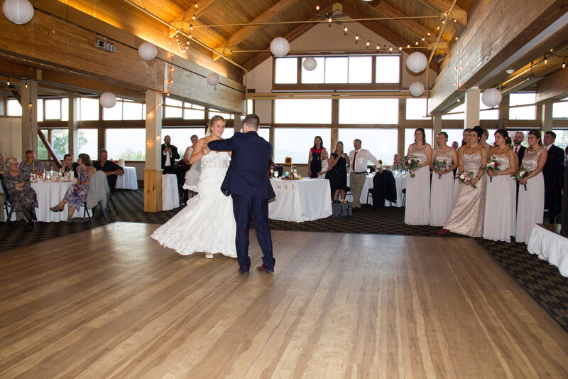Bride and Groom dancing together on the dance floor | Wedding Photography