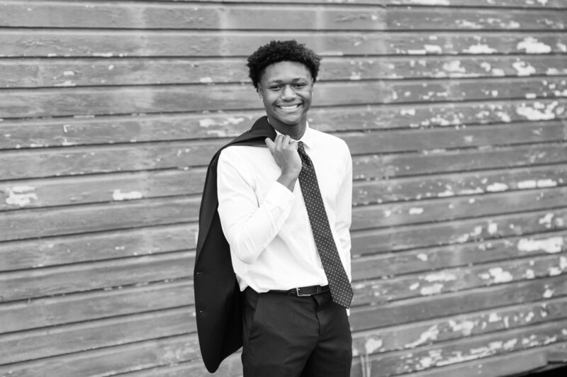 senior boy wearing a suit and tie in chagrin falls, ohio