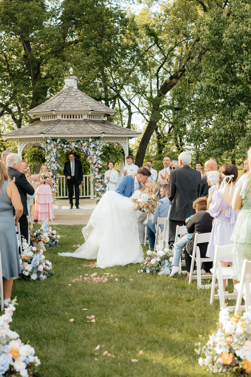 A bride walking herself down the aisle.