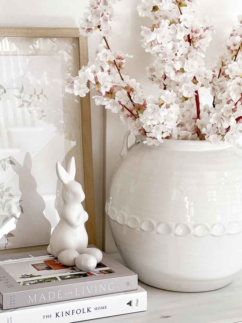 White vase spring cherry blossom stems 