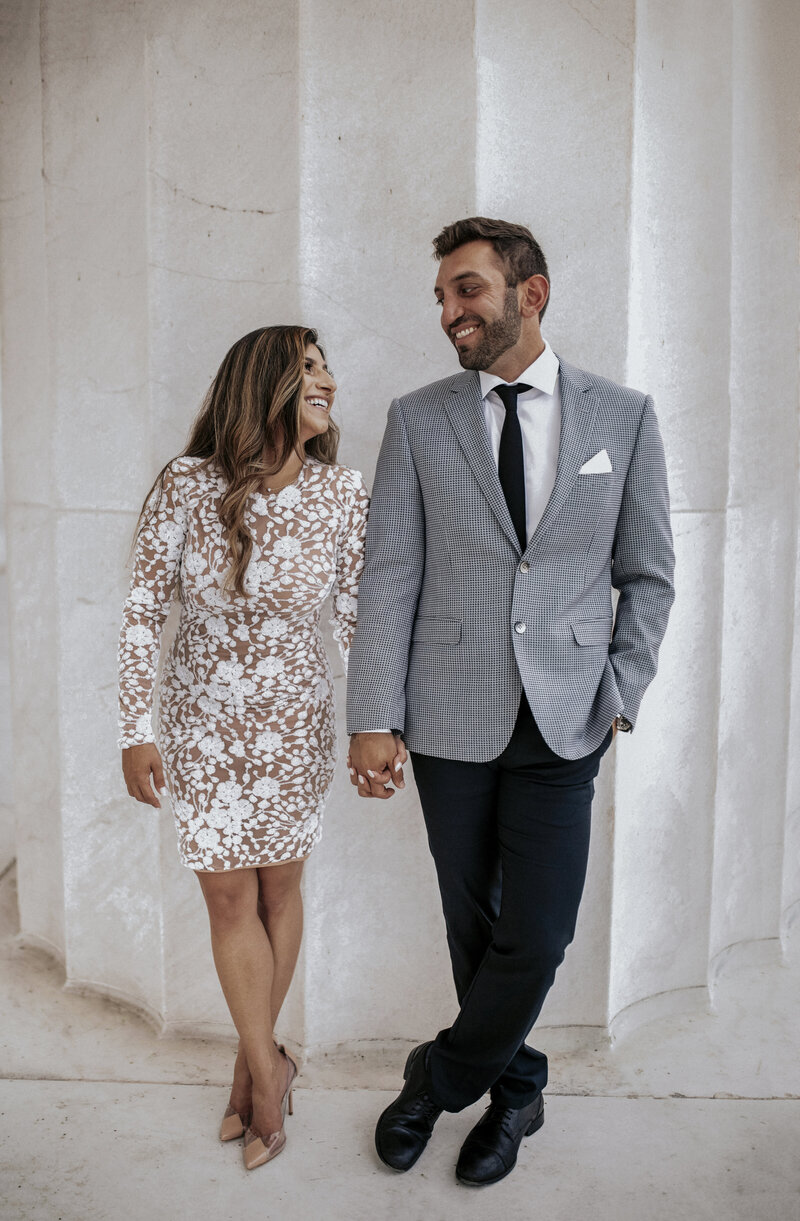 chic-engaged-couple-white-lace-dess