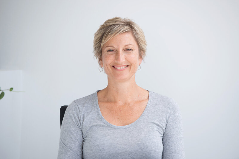 Women sitting in a chair with eyes closed