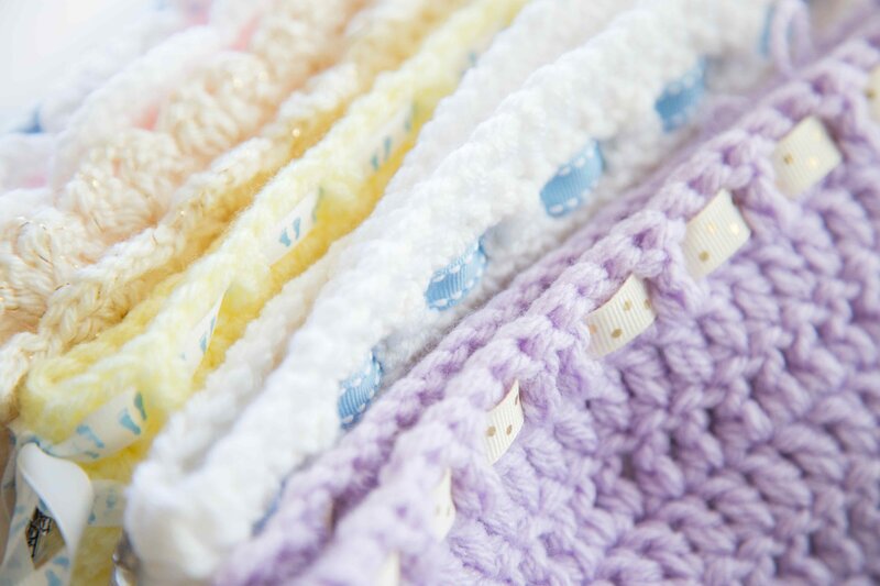 knit crochet yarn cradles for charity