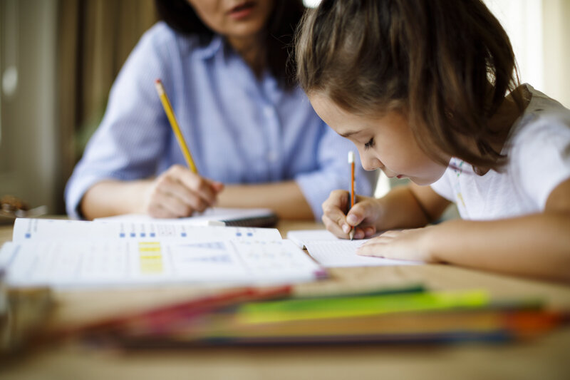 Young student receiving reading tutoring