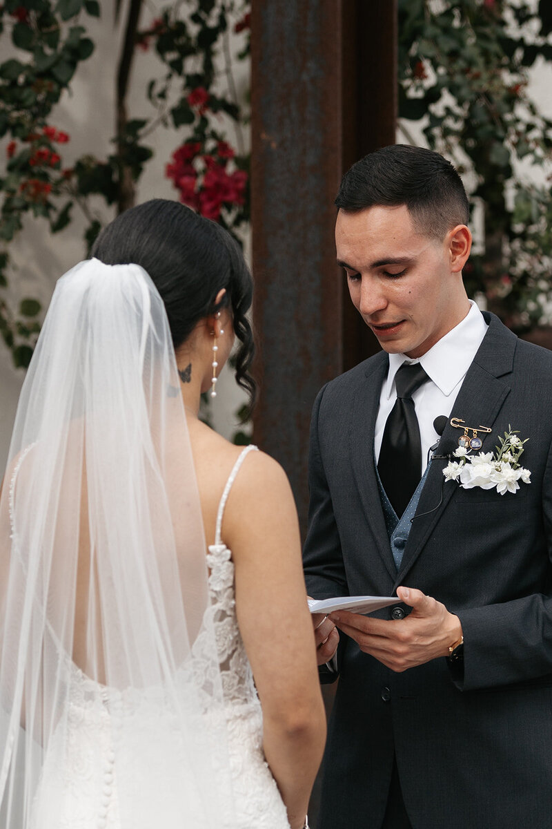 gainesville fl photographer portfolio image of bride and groom saying vows