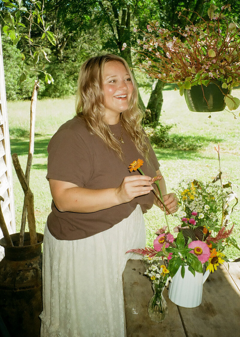 Rooted Wildflower photography portrait of her picking flowers