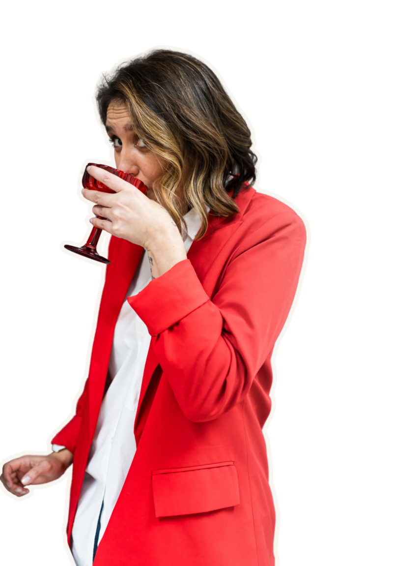 Small business branding expert celebrating with champagne after successful brand and website launch.