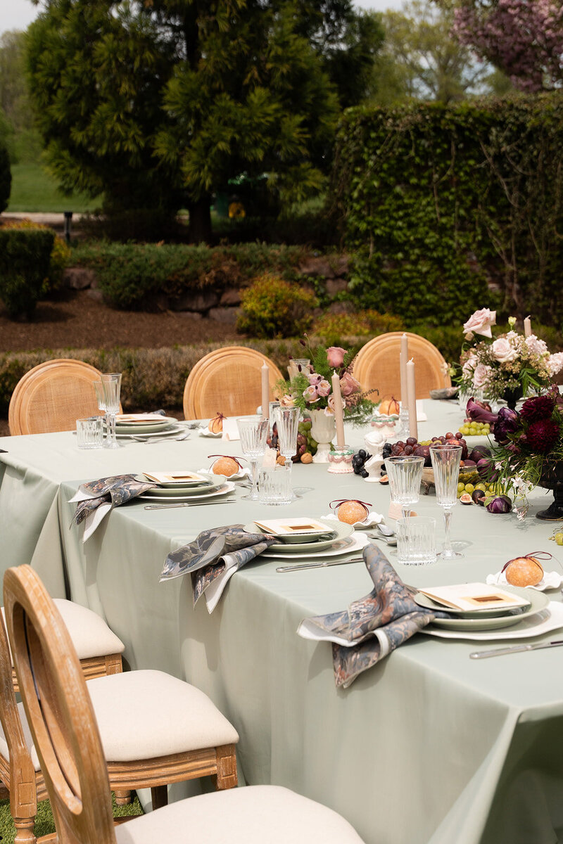 Reception tables decorated with flowers at Elbow Country Club in New Jersey