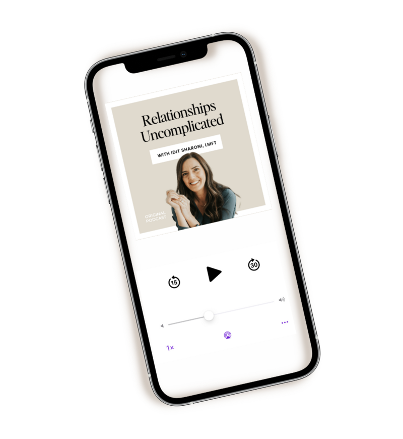 An Iphone screen is opened to Idit Sharoni's podcast, with her smiling brightly on the screen. She is a marriage counselor in florida that offers support for infidelity recovery, marriage counseling, and other services.