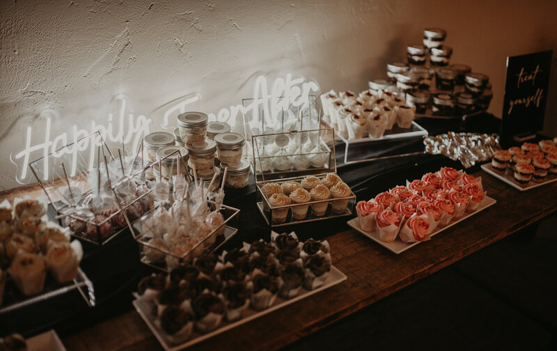 Luxurious wedding reception with customized decor, table settings, and lighting designed by Desert Daisy Events.