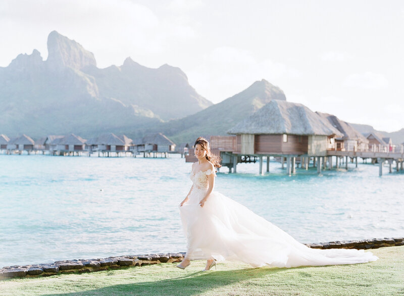 Portrait Bride and groom in front of Mount Otemanu in Bora Bora