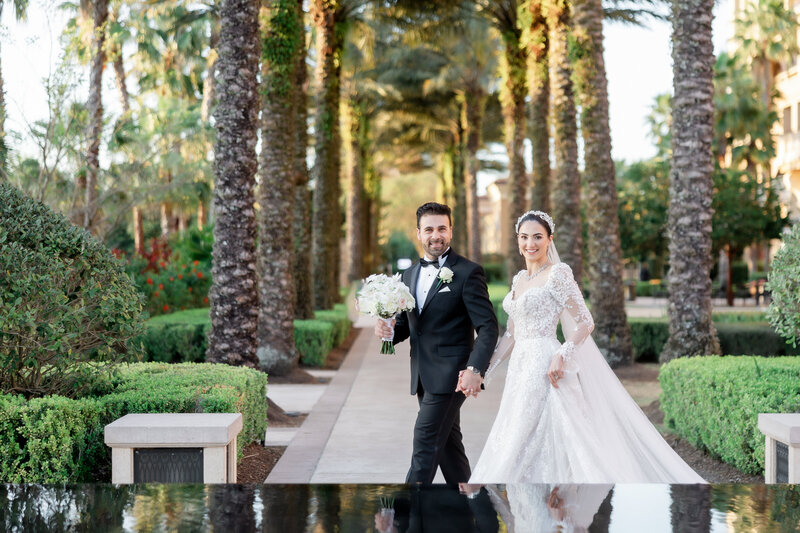 Bride and groom portrait at a wedding at the four seasons Orlando by Florida wedding photographer.
