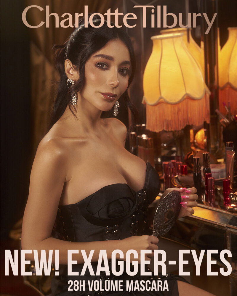 Shima Katouzian posing with a glamorous expression for the Charlotte Tilbury 'Exagger-Eyes' 28H Volume Mascara campaign, photographed by Ylva Erevall.