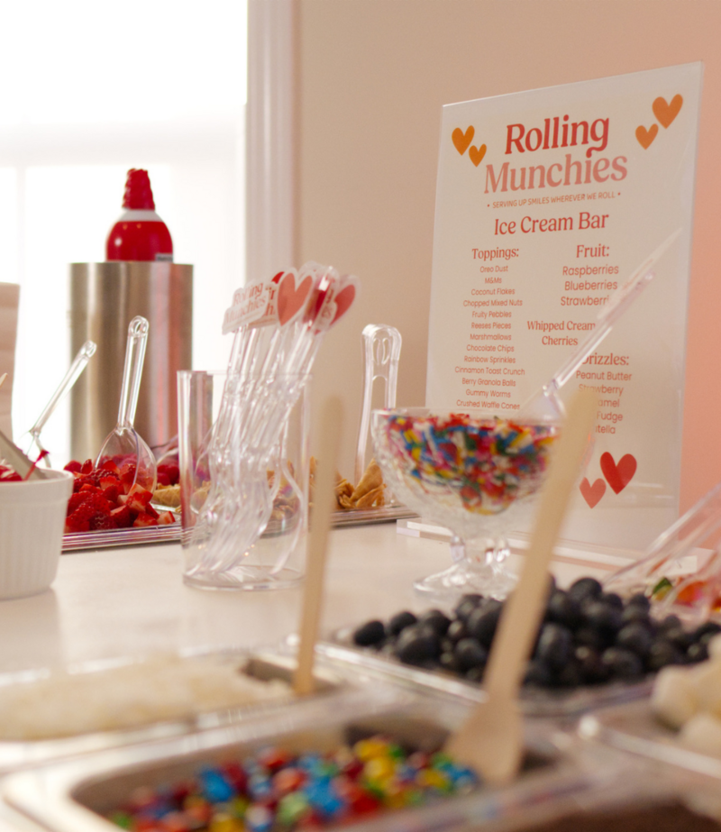 Party-ready mobile ice cream cart with toppings